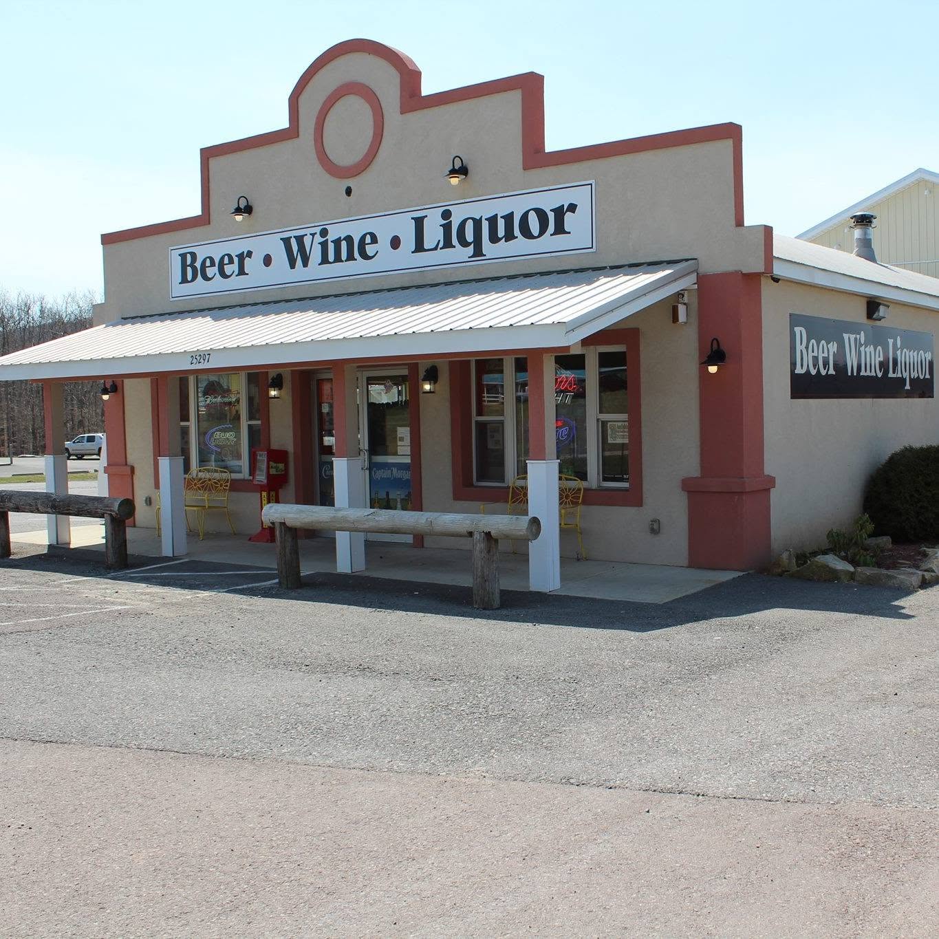 Deep Creek Beverage on Garrett Highway in McHenry, Maryland — the storefront and its Beer, Wine, Liquor sign seen from the parking lot